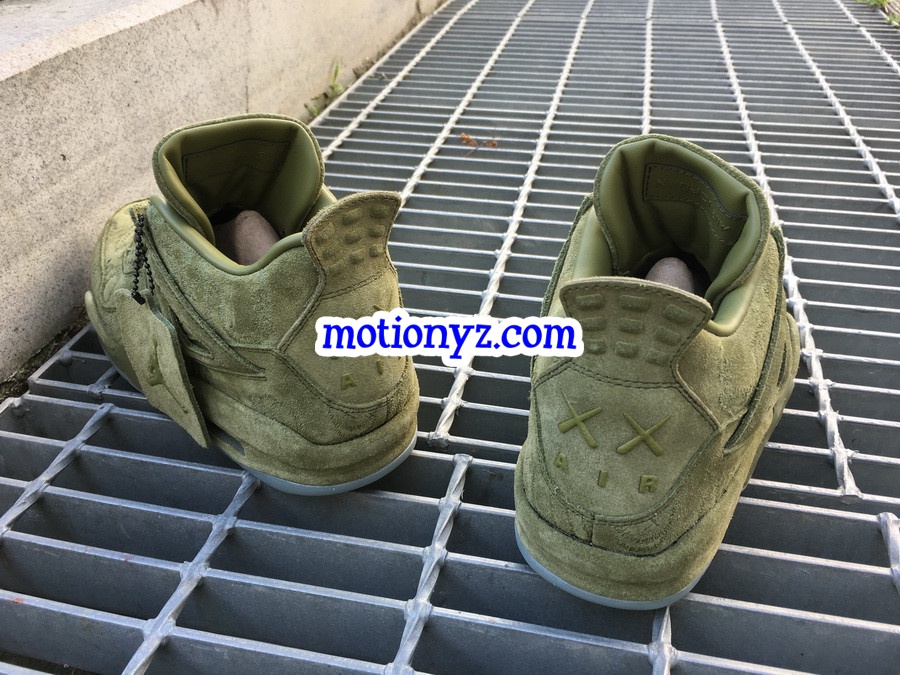 Kaws x Air Jordan 4 Dark Green